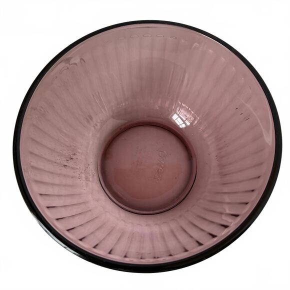 Vintage Pyrex ribbed glass mixing bowl in a purple hue